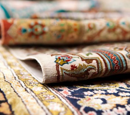 Selective focus image of Persian silk rugs